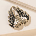 Myra Guardian Angel Brooch in Platinum Night